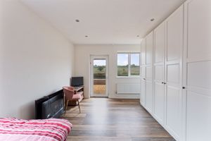 Bedroom One- click for photo gallery